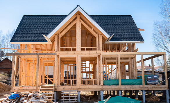 Wooden house frame construction. Manufacture of houses made of wood.