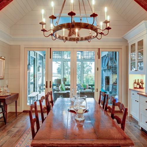 Elegant dining room with chandelier and outdoor view