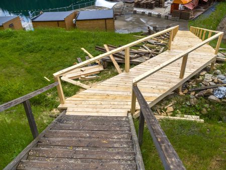New wooden stairs outdoors. Carpenters work.