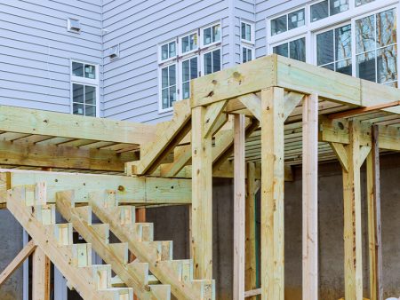 Fragment planks installing wood floor for patio deck with new wooden decking