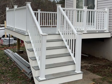 White stairs leading to a deck