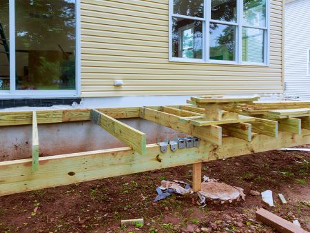 Repair and replacement of wooden deck or patio with modern material installation new home