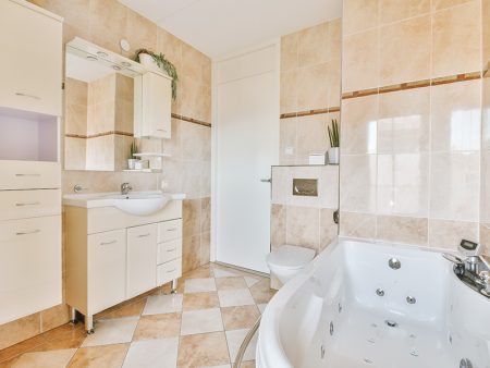Bathroom interior finished with marble tiles